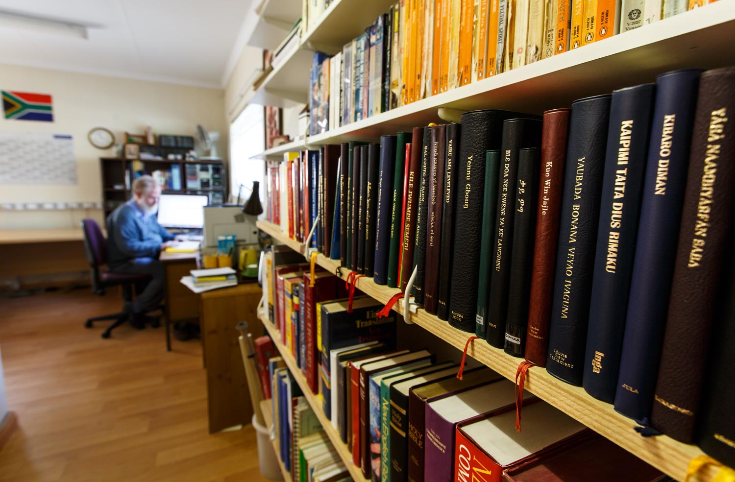 Shelf of Bibles in various languages